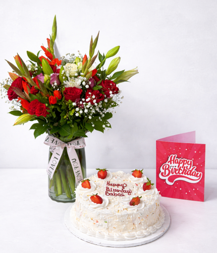Vased Flowers with a whiteforest cake
