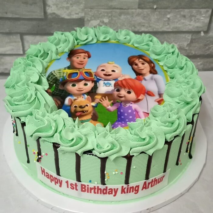 Cocomelon edible print on a cake Cocomelon edible print on a cake