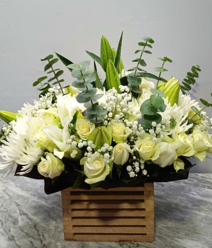 White themed flowers wooden box arrangement
