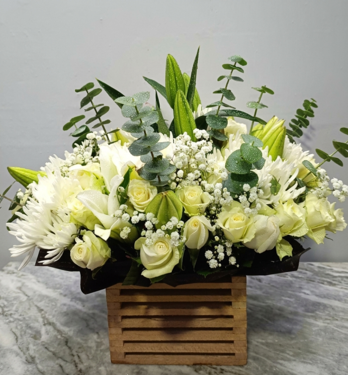 White themed flowers wooden box arrangement