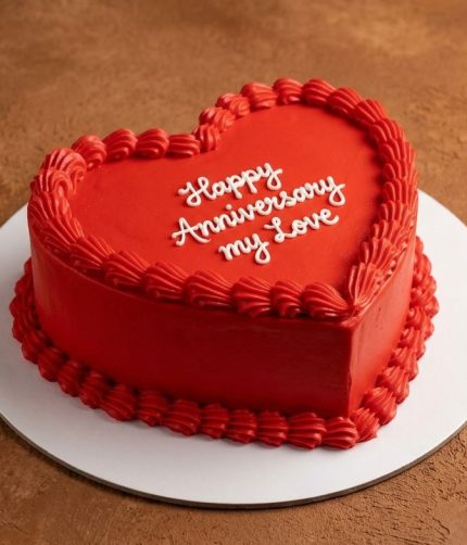 Happy ANniversary read heartshaped cake